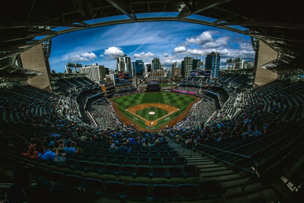 aerial photography of ballpark stadium surrounded by crowd of people